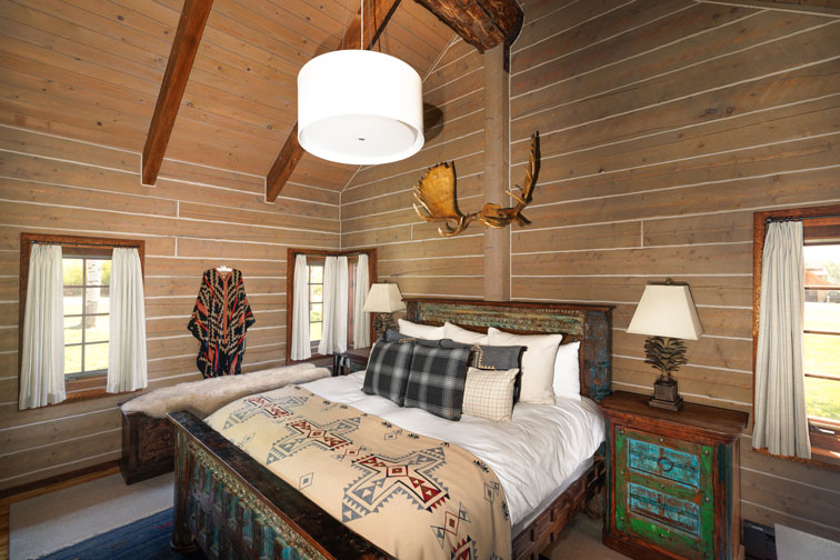 The bedroom of a family cabin at The Home Ranch in Colorado.