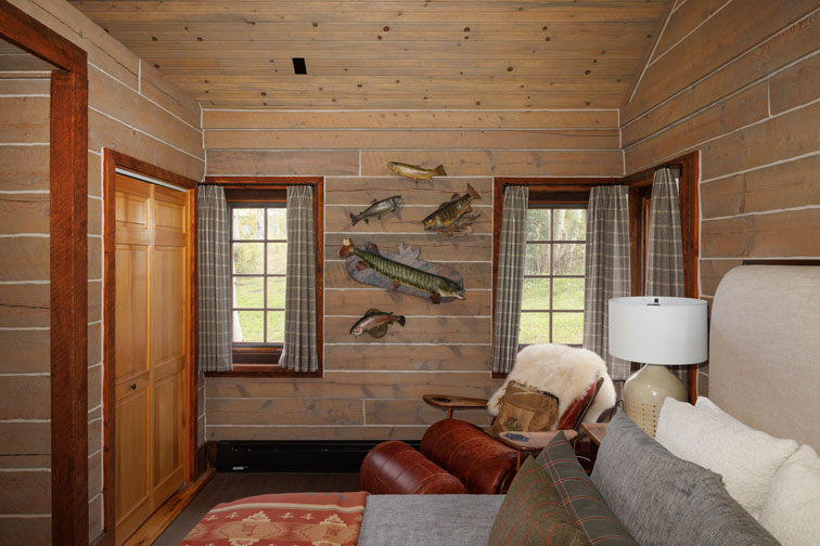 The cozy interior of a guest cabin at The Home Ranch in Colorado.