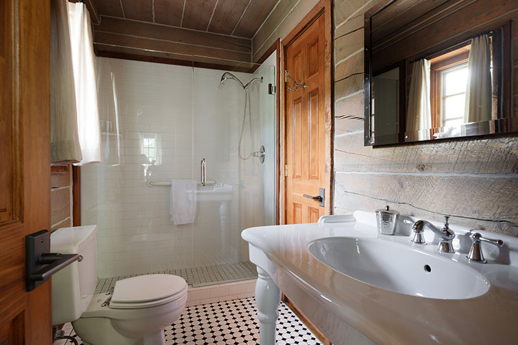 Bathroom and amenities of a luxury traditional wood cabin in Clark, Colorado.