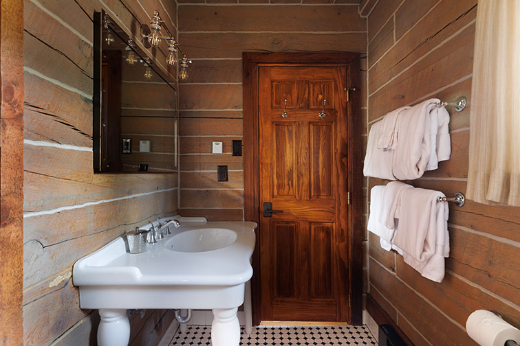 Bathroom and amenities of a luxury traditional wood cabin in Clark, Colorado.