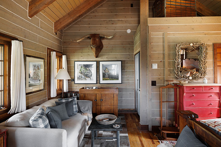 Cozy living room of a luxury guest cabin at The Home Ranch.