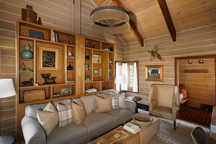 Living room of a a cozy guest cabin at The Home Ranch in Colorado.