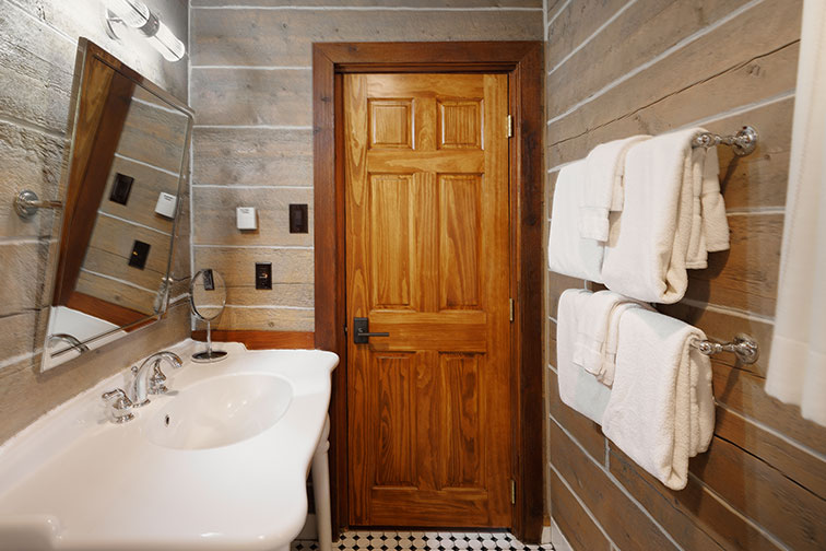 Bathroom amenities of a cozy guest cabin at The Home Ranch in Colorado.