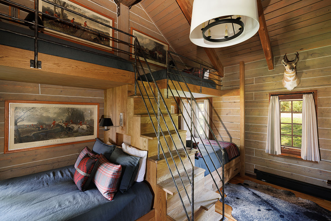 The Bunkhouse guest cabin is a spacious retreat that offers a comfortable stay for up to seven guests. Sleeping areas range from bunk beds to a king-sized bedroom.