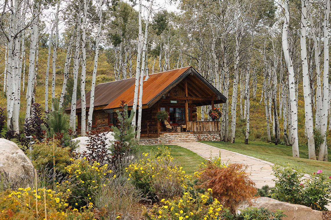 In this cozy hideaway for two called Compromise, every detail is meticulously considered — from the retro-style record player to the unique seating nooks and inviting king-size bedroom.