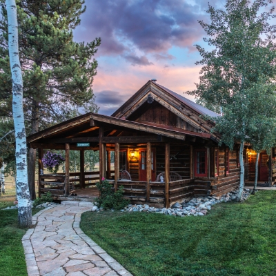 The exterior of the Birdhouse guest cabin at The Home Ranch in Colorado.