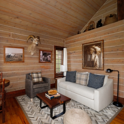 The Sundown guest cabin is a hideaway meant for two complete with a screened in porch.