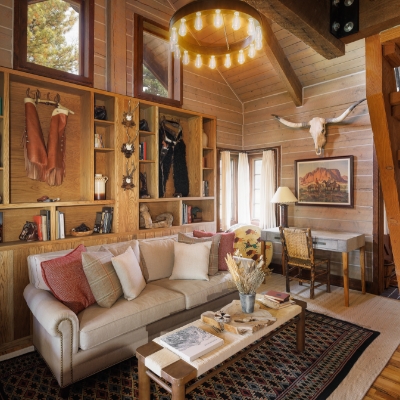 The interior of a cozy cabin at The Home Ranch in Colorado.