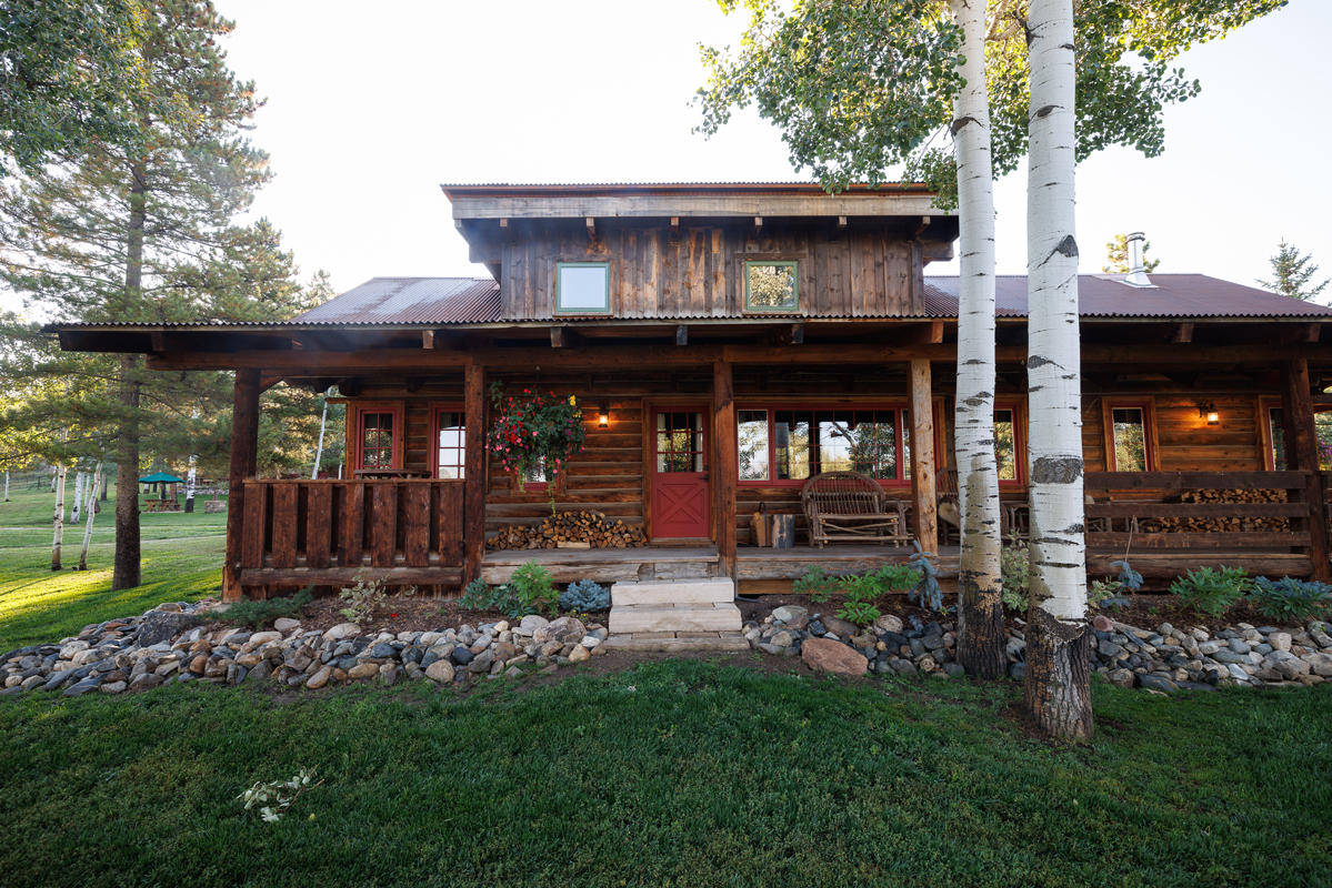 The front facade of the Birdhouse guest cabin at The Home Ranch in Colorado.