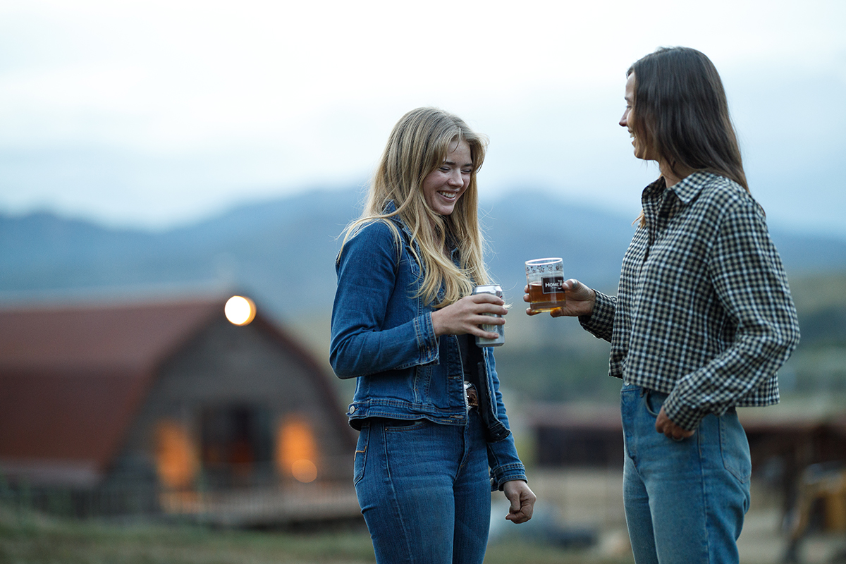 A group enjoying the quiet of the Colorado mountains at their exclusive luxury group event at The Home Ranch.