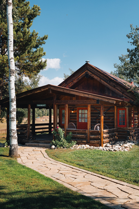 A spacious deck attaches to the studio-style set-up of the Birdhouse guest cabin at The Home Ranch in Colorado.