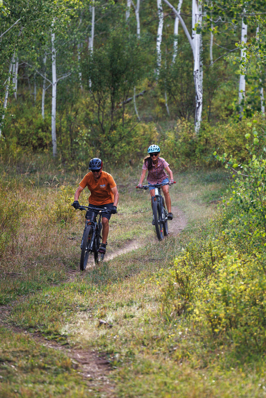 Mountain biking is one of the many exclusive group event experiences at The Home Ranch in Colorado.