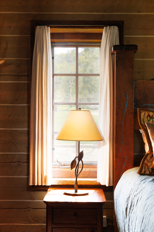 Beautiful views from the window of The Home Ranch's studio style guest wood cabin, Roo.