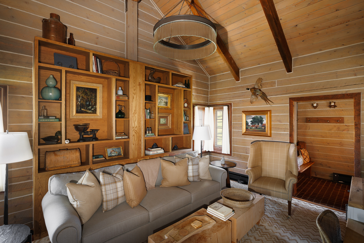 The living space of a cozy guest cabin at The Home Ranch in Clark, Colorado.