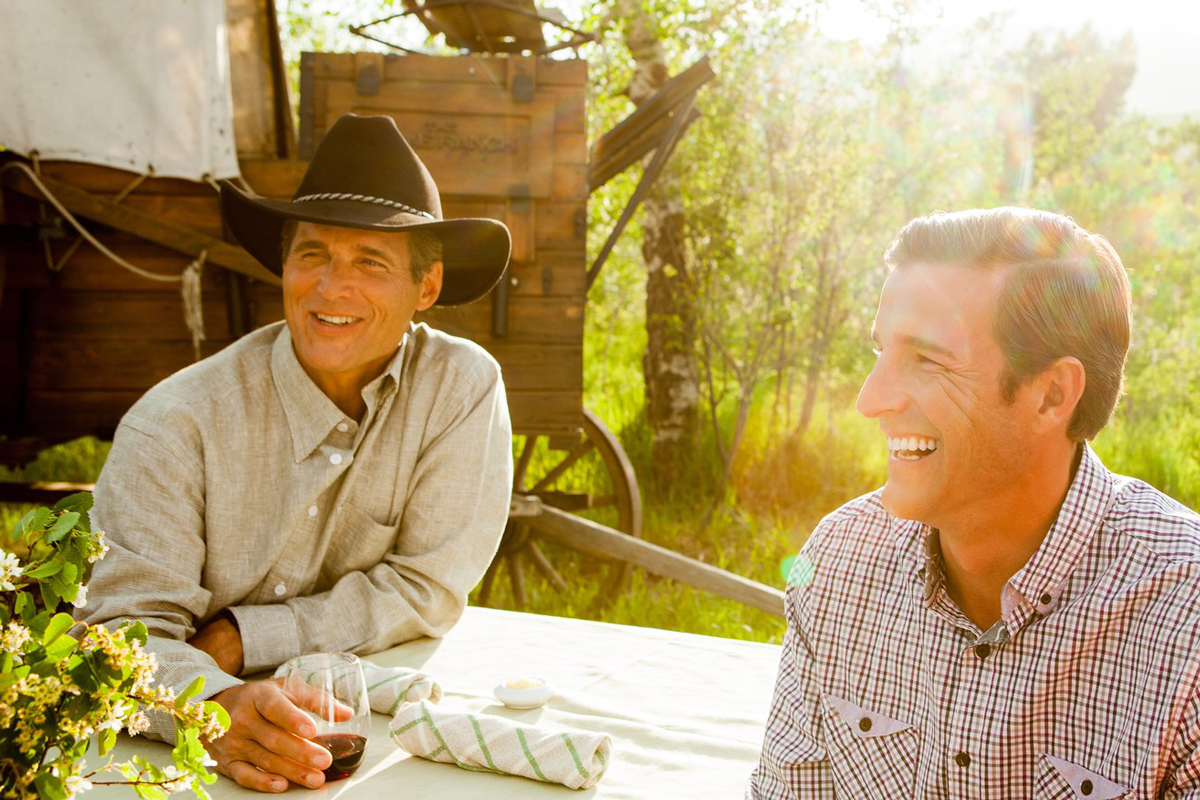 Two men enjoying a luxury Colorado corporate retreat at The Home Ranch in Colorado.