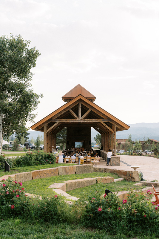 Outdoor pavilion at The Home Ranch surrounded by lush greens