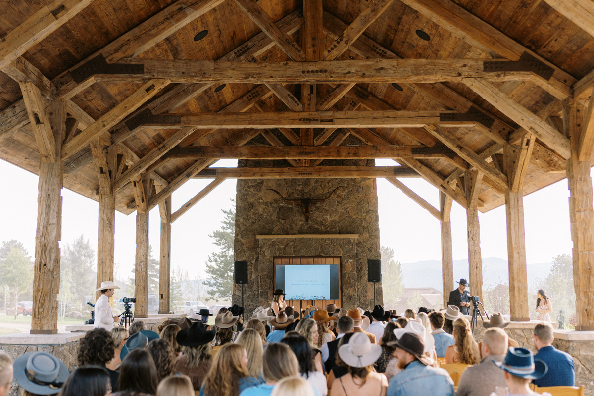 Corporate retreat speaker under pavilion area at The Home Ranch
