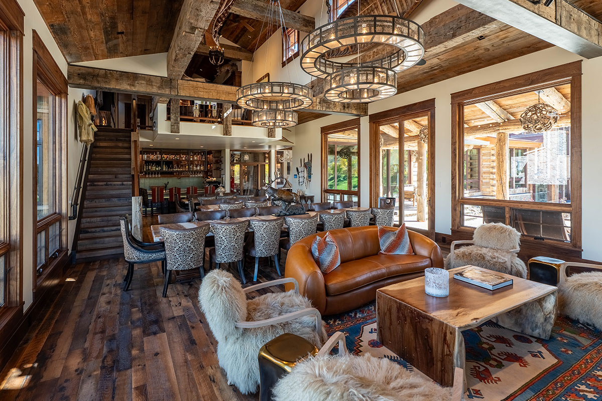 Rustic cozy living room inside Great Lodge at The Home Ranch.