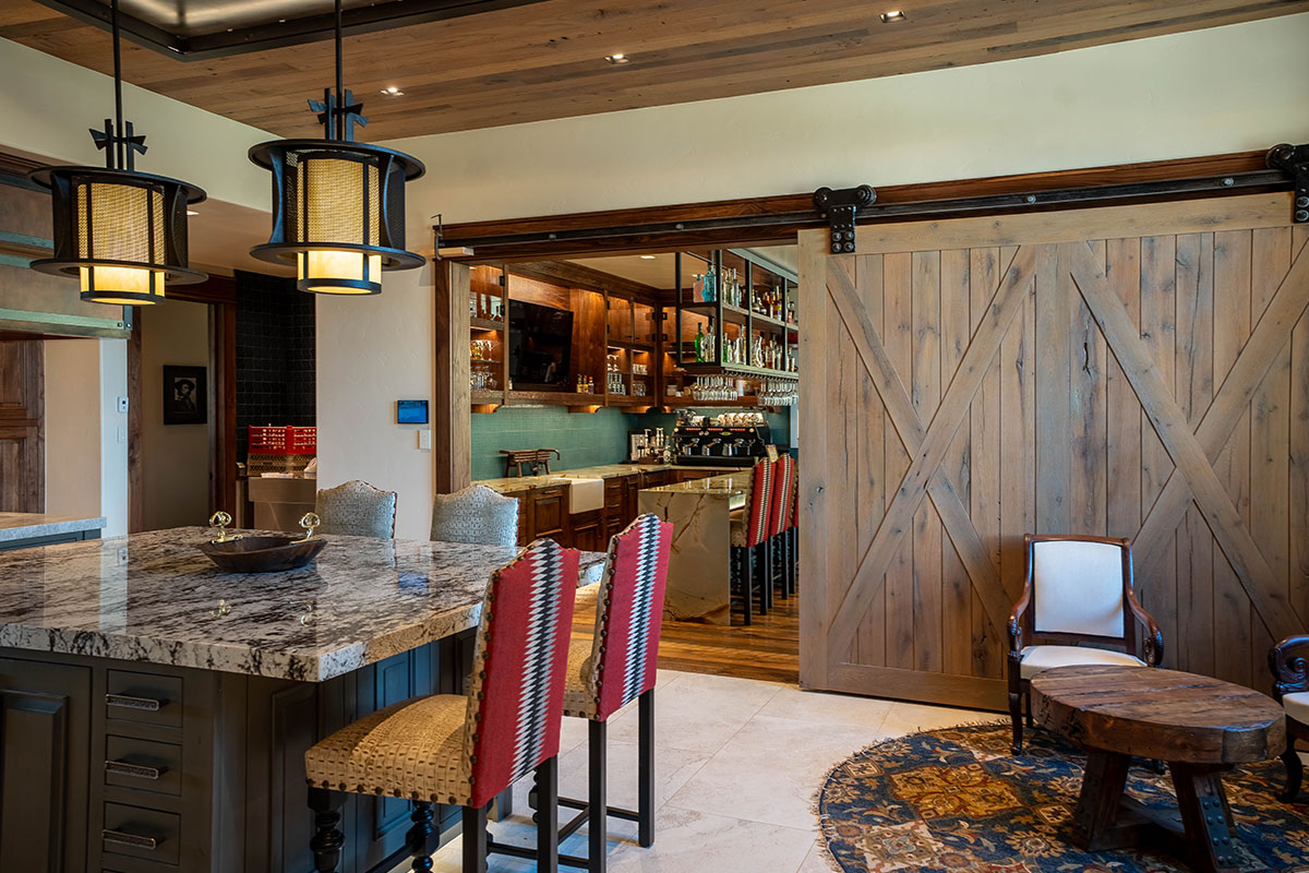 Doorway to bar area of The Lodge, a two-room suite at The Home Ranch in Colorado.
