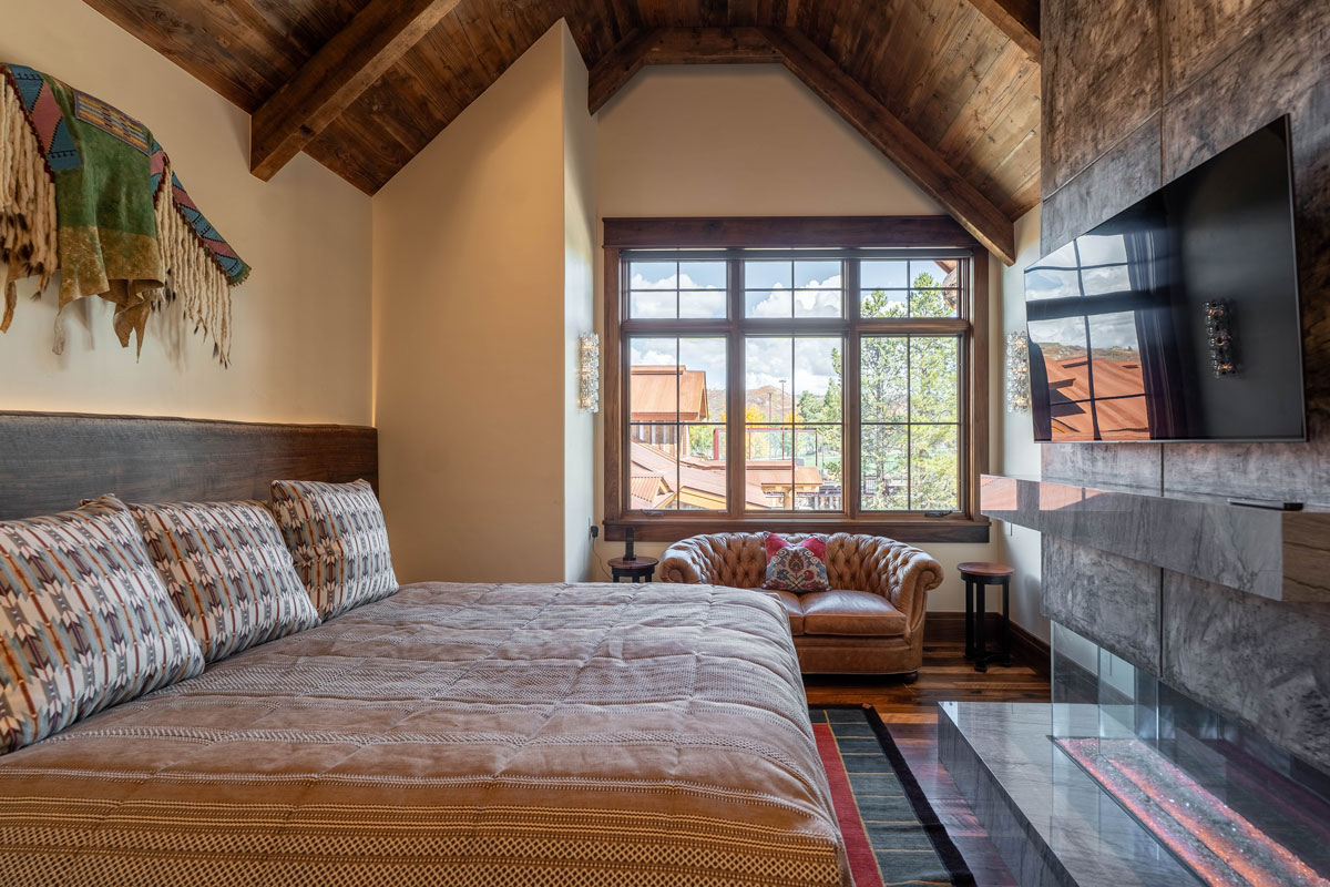 Bedroom at The Lodge, a two-room suite at The Home Ranch in Colorado.