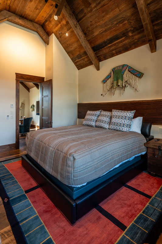Bedroom at The Lodge, a two-room suite at The Home Ranch in Colorado.