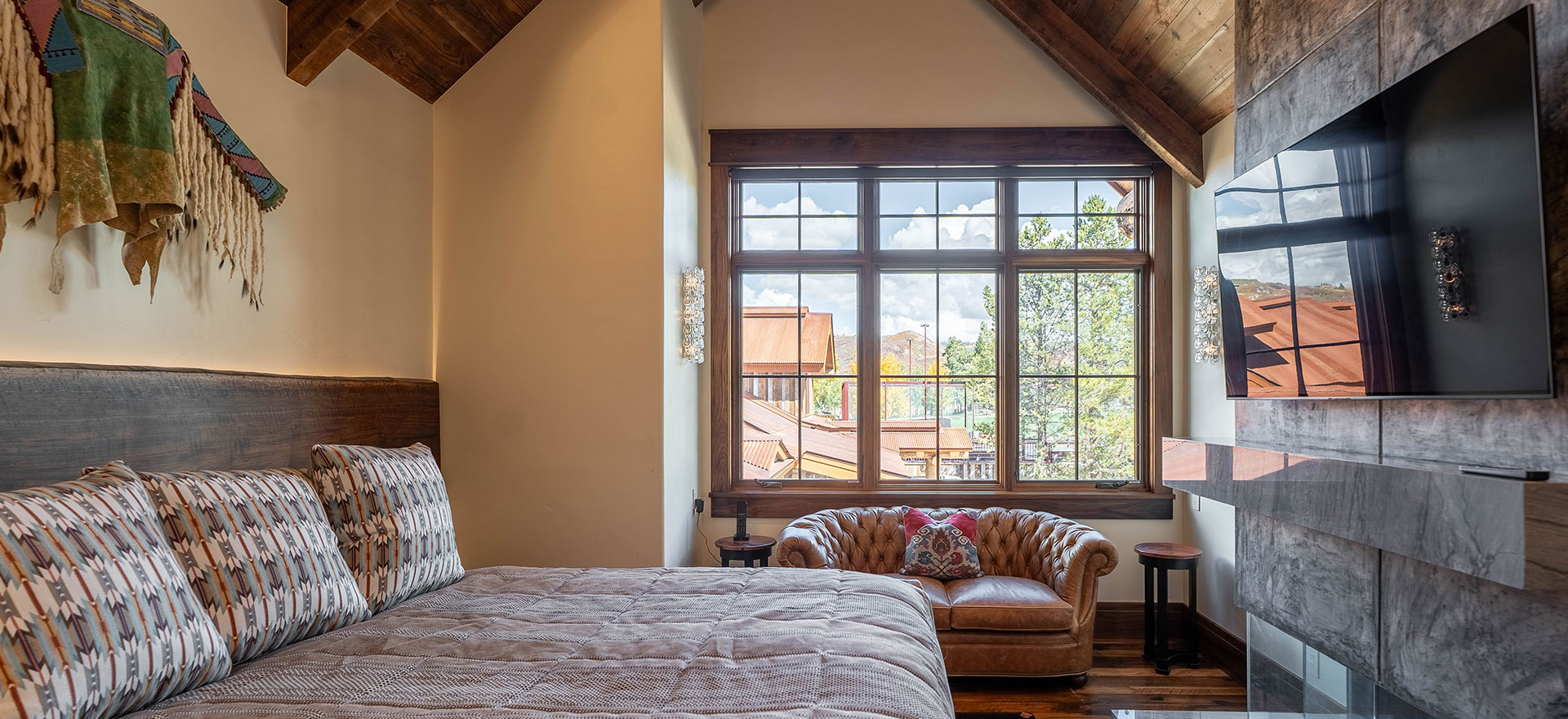 Bedroom at The Lodge, a two-room suite at The Home Ranch in Colorado.