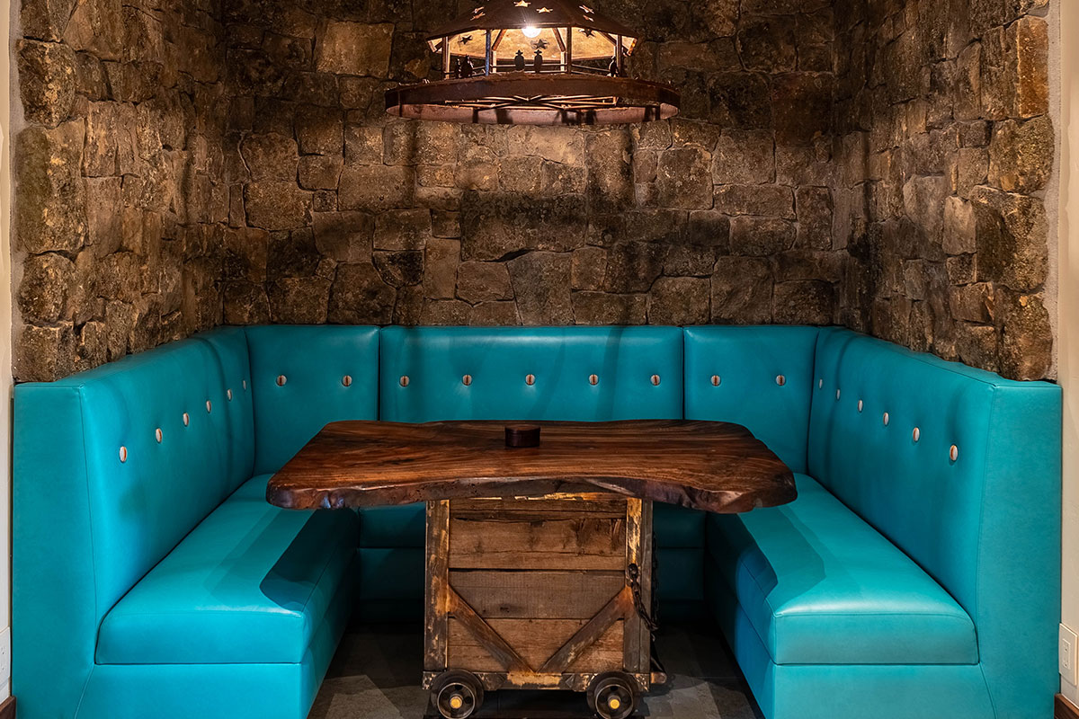 Kitchen booth of The Lodge, a two-room suite at The Home Ranch in Colorado.