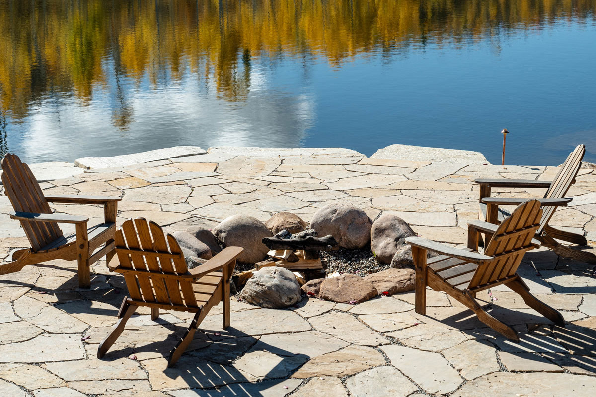 Pond side seating at The Home Ranch